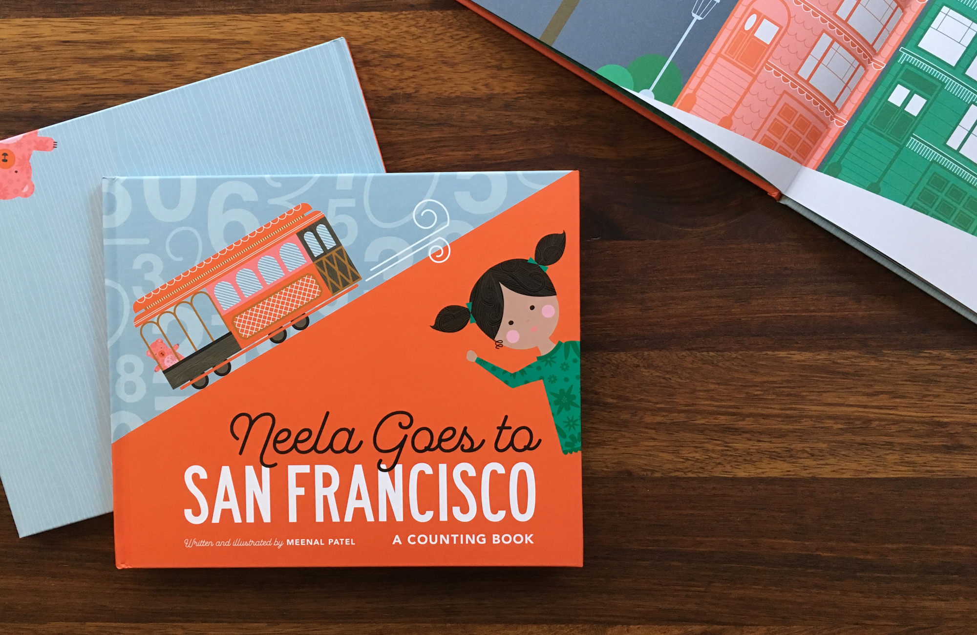 Splash image of Neela Goes to San Francisco book on a wood table